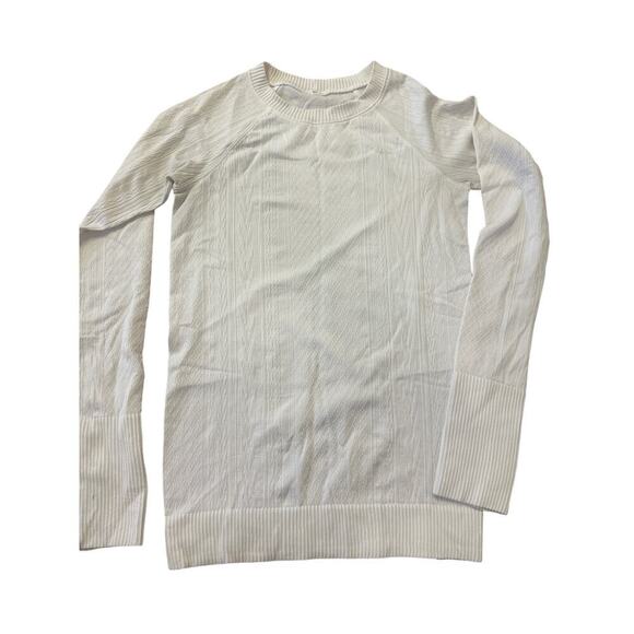 Lululemon Tops - Lululemon long sleeve top white Xsmall/Small Women’s has thumb holes